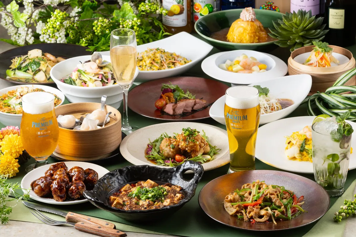 A variety of Chinese dishes and drinks on a table