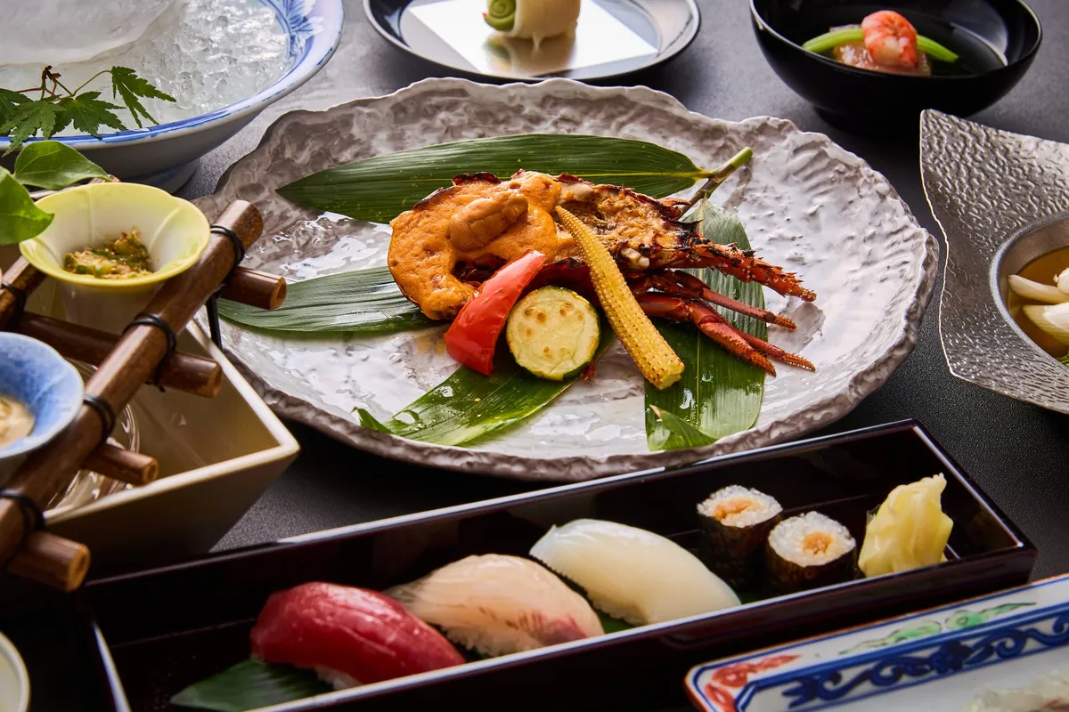 Grilled Ise Ebi with sea urchin sauce and a selection of sushi