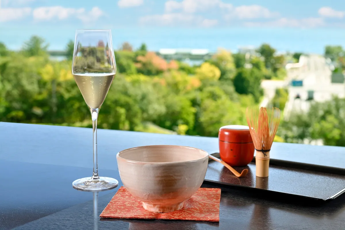 Matcha bowl and sparkling wine glass