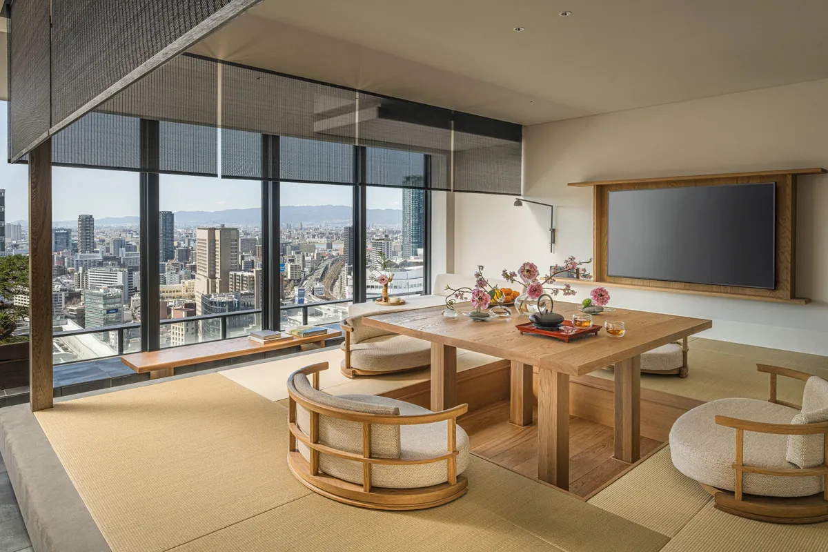 GENSUI suite with tatami flooring and city views