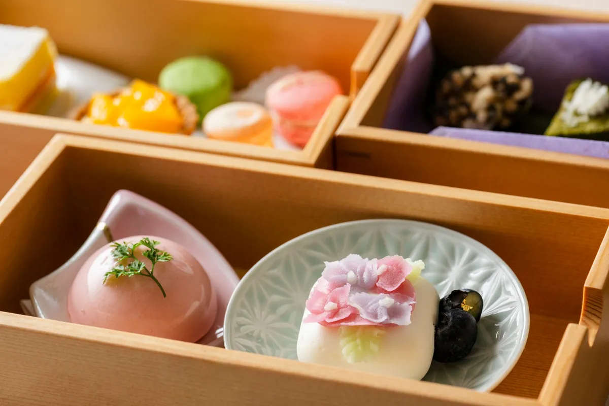 Close-up of Nagasaki-inspired sweets in wooden boxes