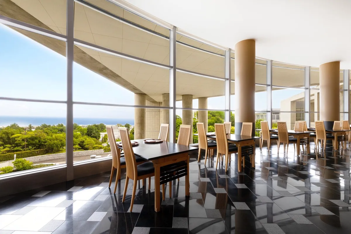 Restaurant interior with floor-to-ceiling windows