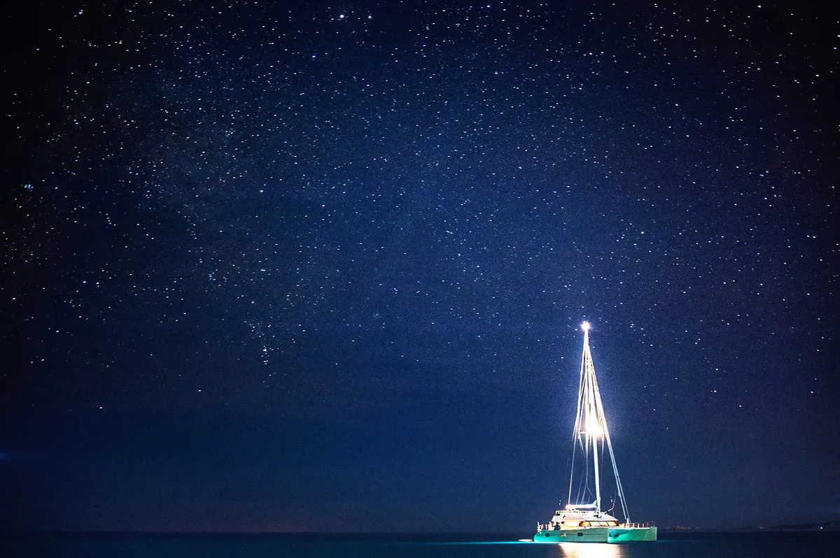 Yacht under a starry sky