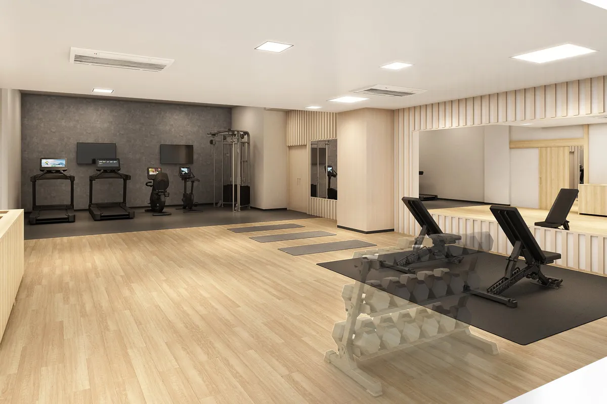 The hotel fitness center with treadmills and weights