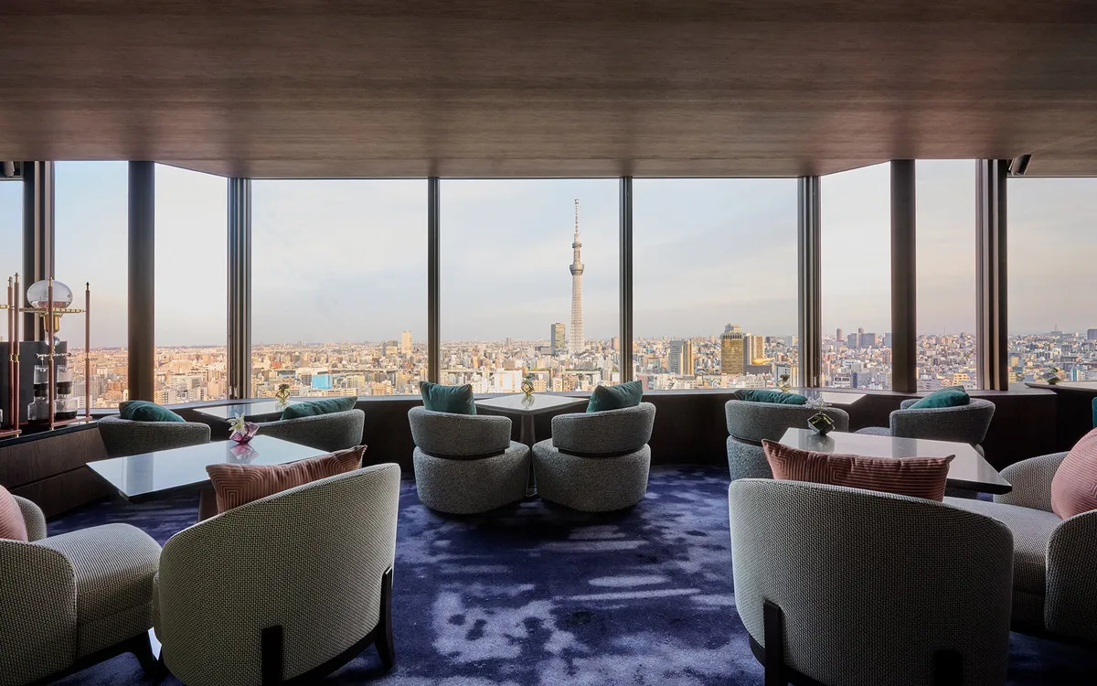 The Tokyo Skytree visible through the floor-to-ceiling windows of the lounge.