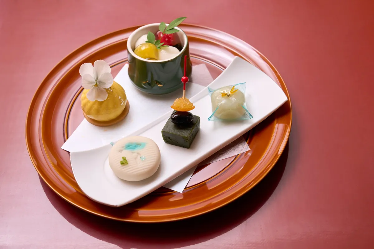 Close-up of seasonal Japanese sweets including mizu-manju and mousse