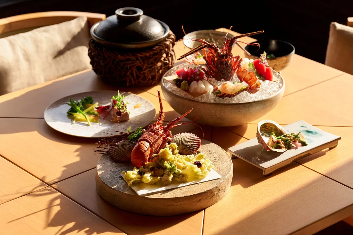 Dinner menus highlight regional specialties including Ise lobster and Matsusaka beef