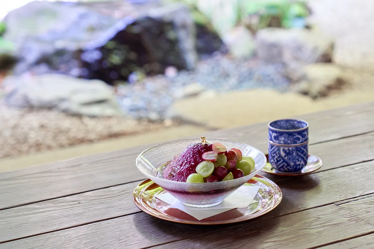 Shaved ice topped with Kyoho and Shine Muscat grapes