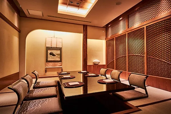 A private dining room with traditional horigotatsu seating and tatami floors