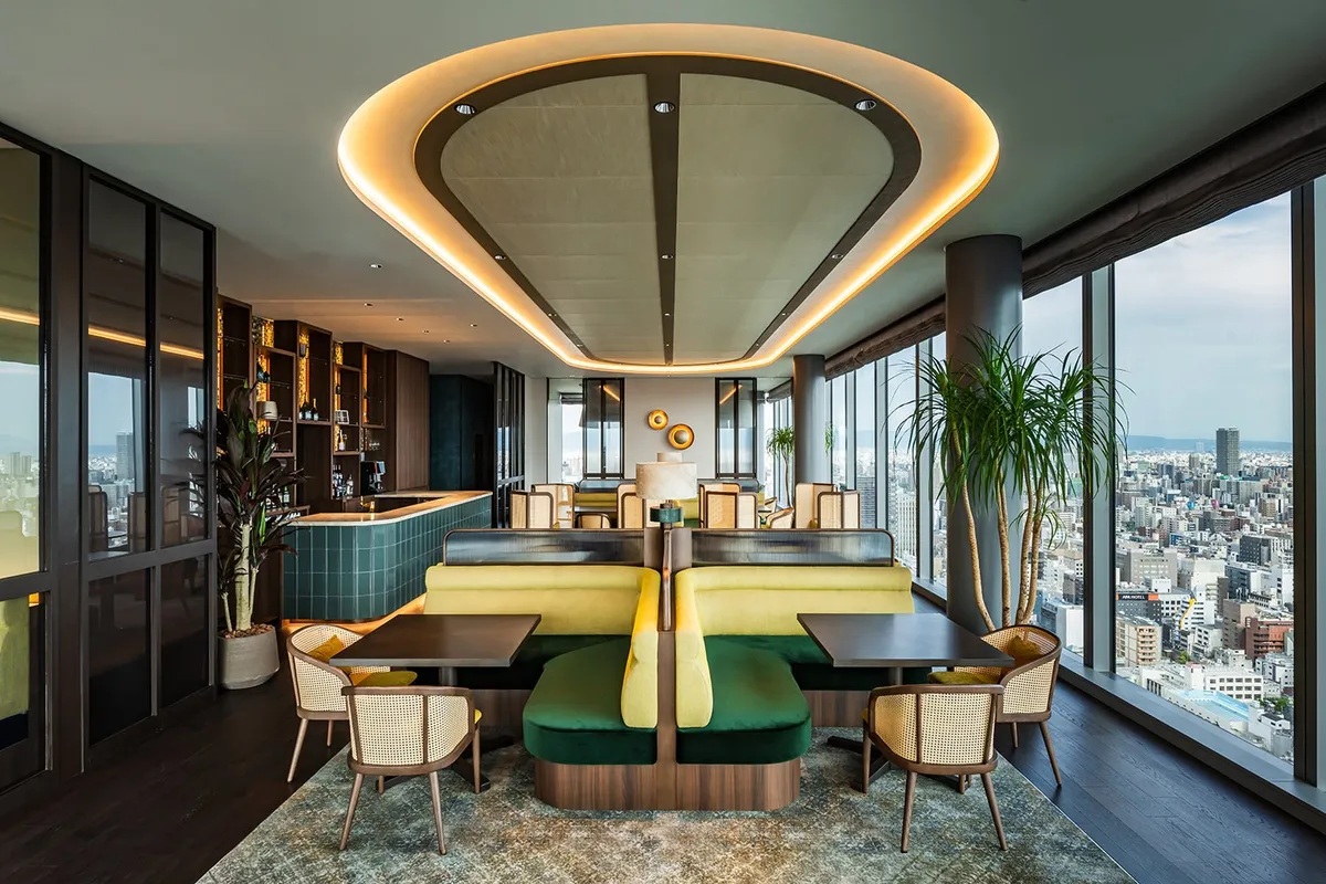 The PEAKS rooftop bar with modern seating and city views