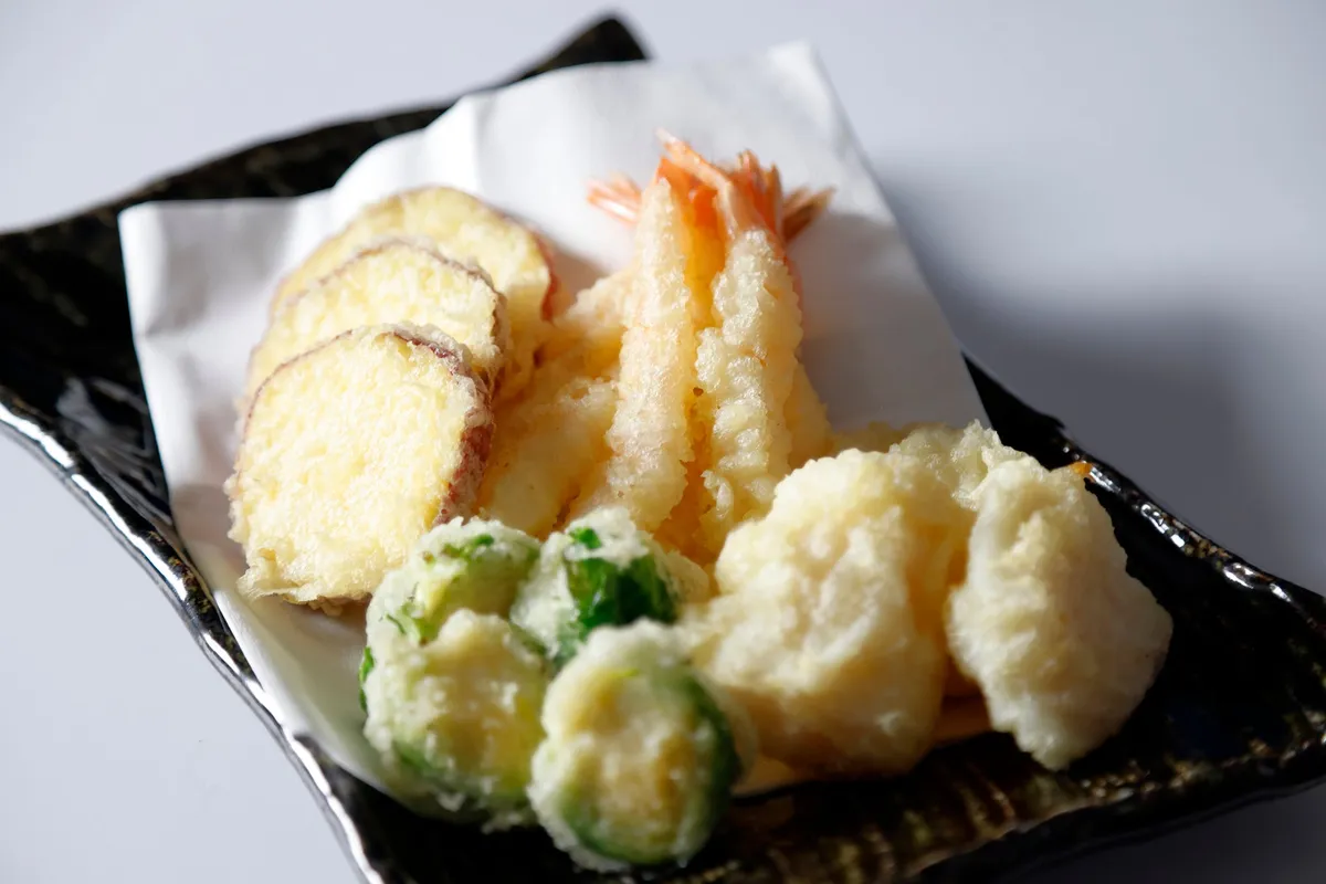 Assorted crispy tempura including shrimp and vegetables