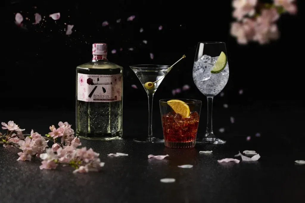 ROKU Sakura Bloom Gin bottle and three signature cocktails