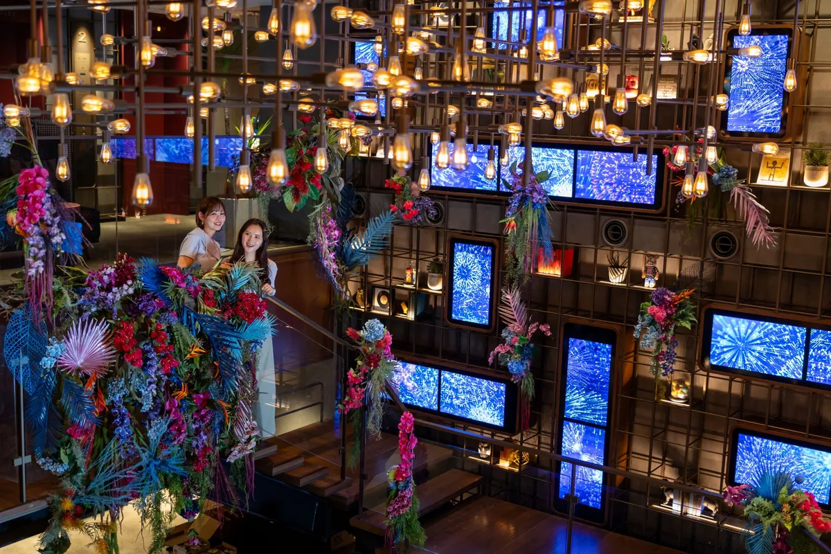 Lobby flower art with hanging bulbs