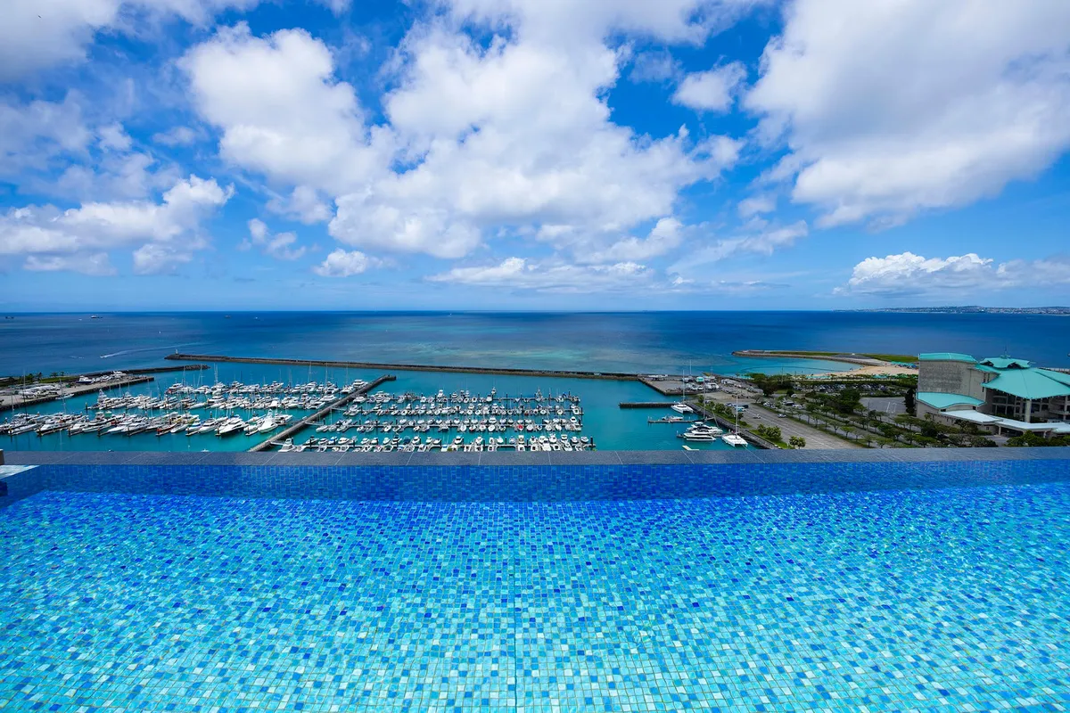 The infinity pool overlooking the Ginowan yacht harbor