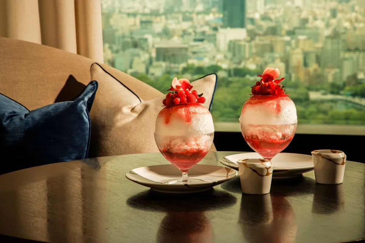 Peach Melba Kakigori overlooking the Tokyo skyline