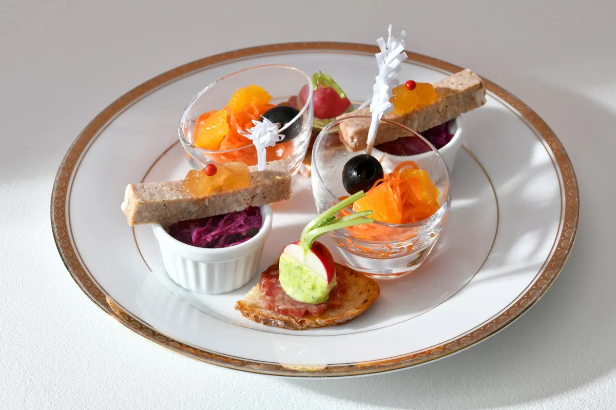 Top tier with radishes and herb butter