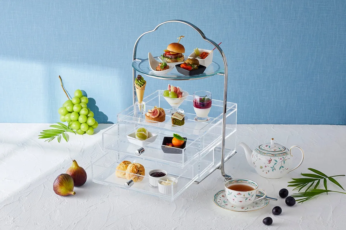 The afternoon tea set presented on a three-tier stand