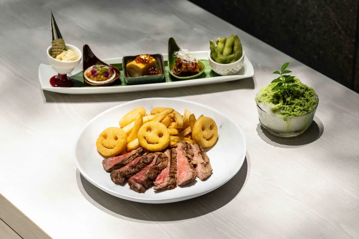 Steak frites and appetizers at WET DECK
