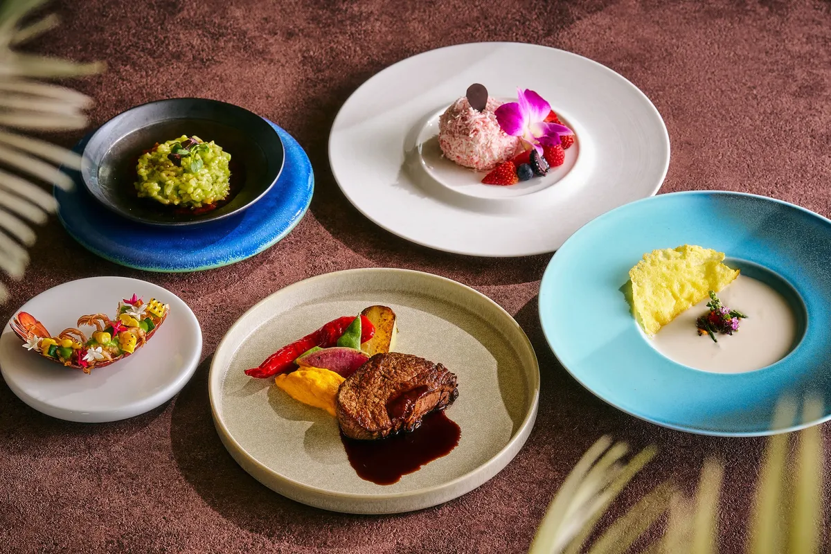 Hawaiian dinner course featuring aged beef and risotto
