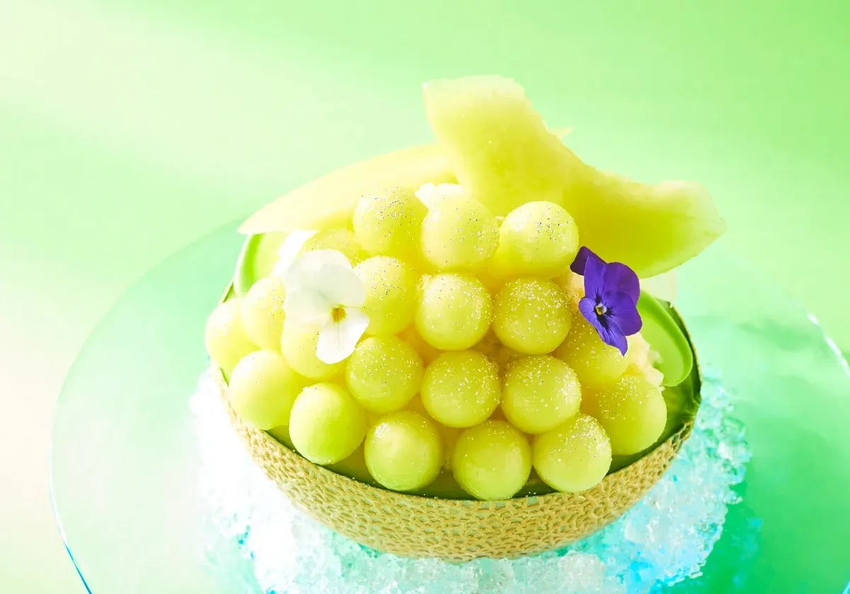 Close-up of Crown Melon spheres on shaved ice