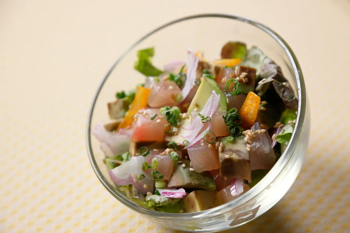 Chilled Ahi Poke with tuna, avocado, and sesame seeds