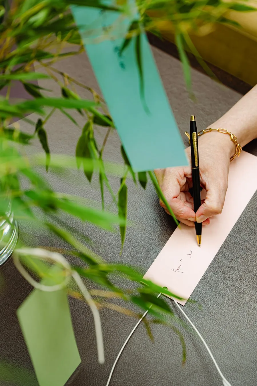Guest writing on a tanzaku paper strip