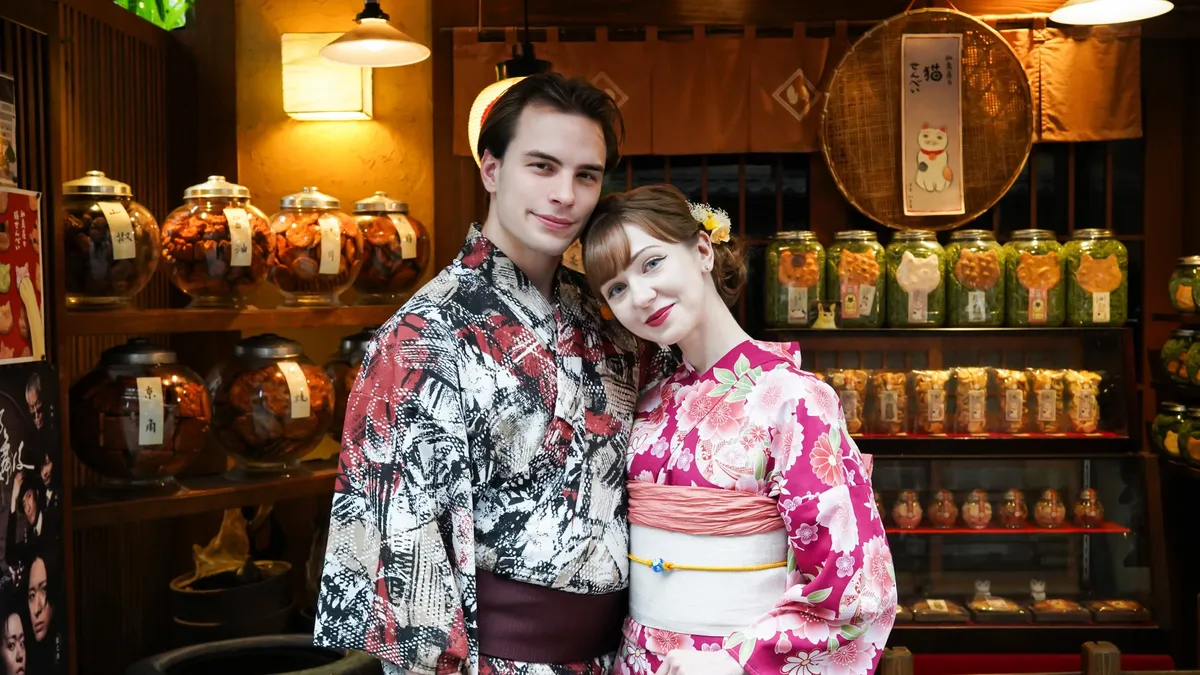 Couple in kimono browsing a traditional Kamakura shop