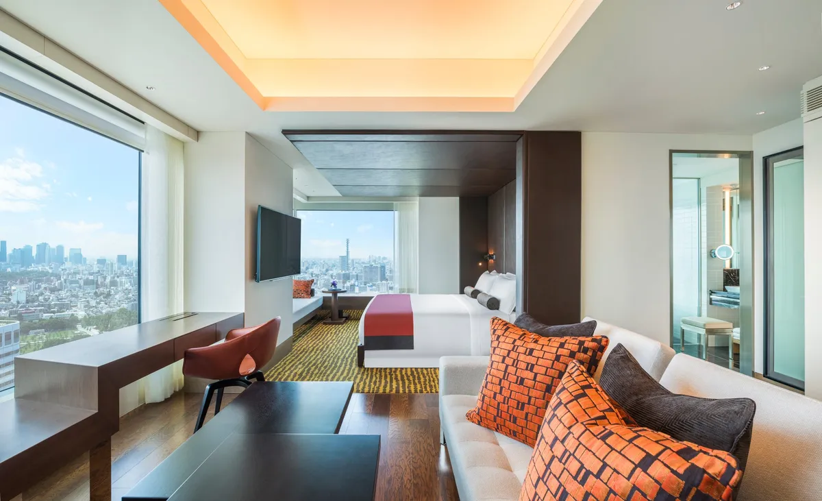 A modern luxury suite with panoramic city views