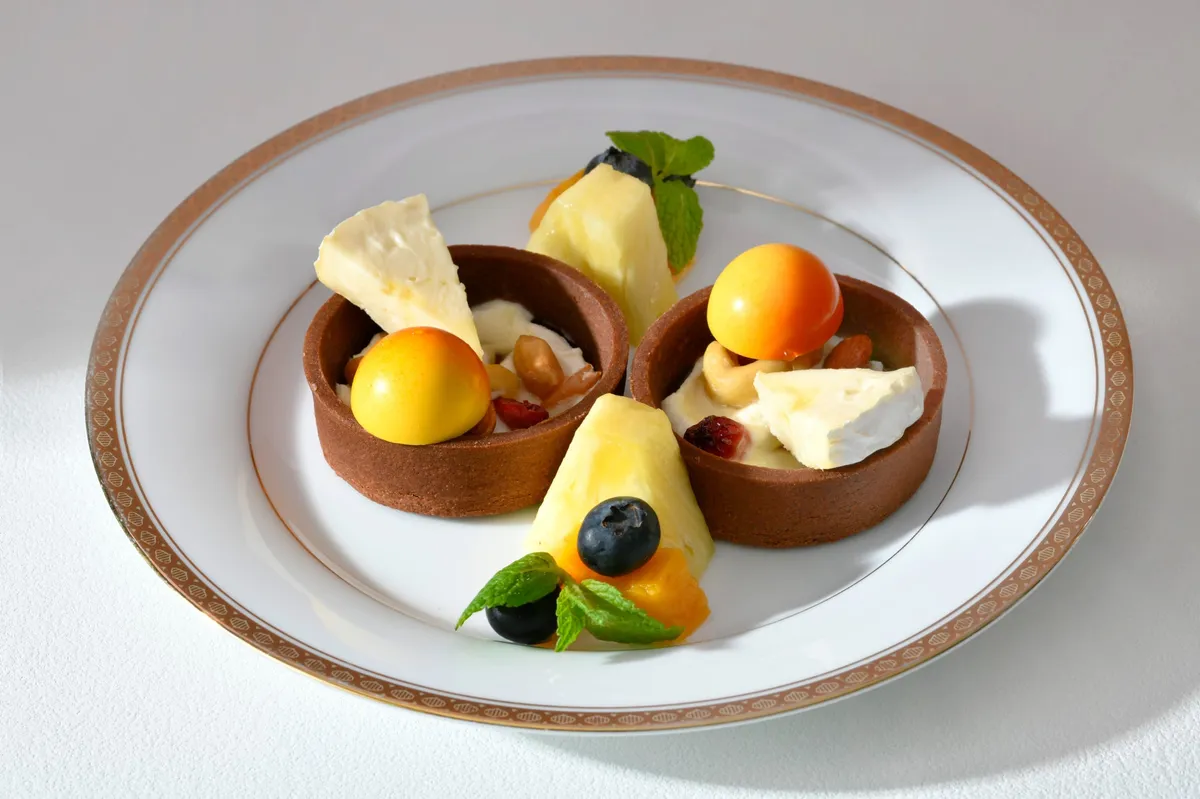Middle tier with cheese and fruit tarts
