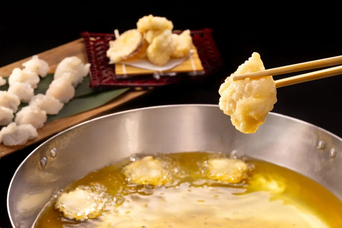 Sea pike tempura being fried