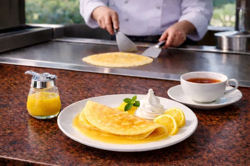 Freshly baked orange crepes