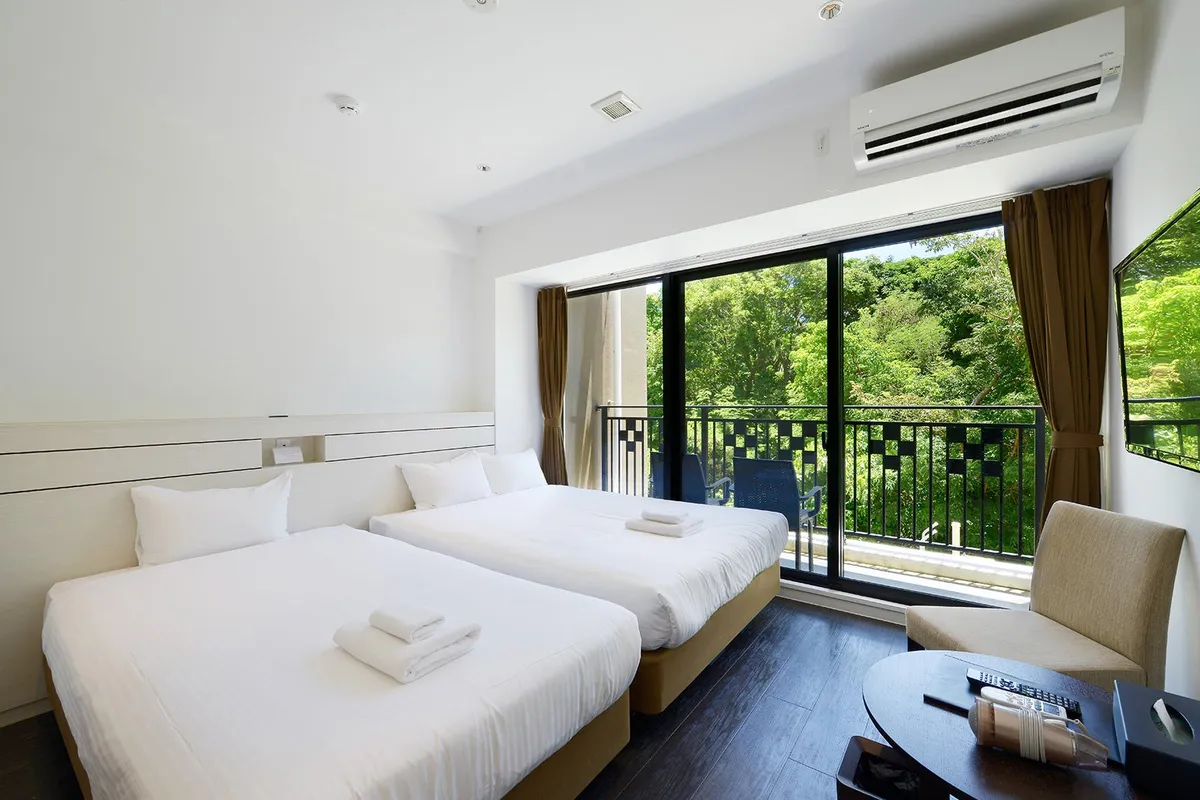 Bedroom area with two large beds