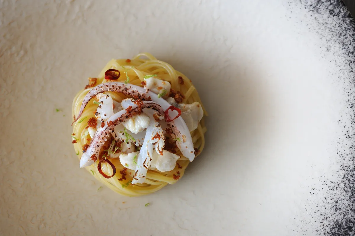 Tajarin pasta with grilled squid and fugu roe