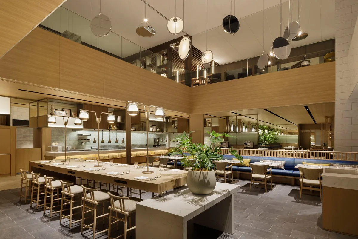 The modern interior of Substance restaurant with high ceilings and open kitchen