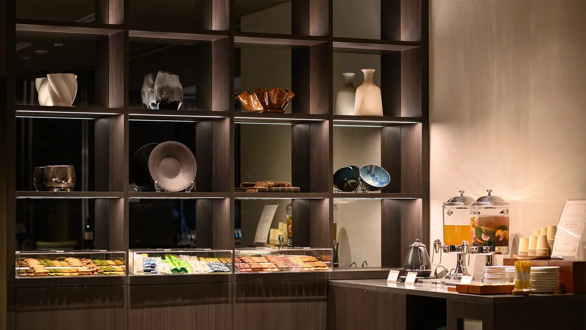 The lobby refreshment station with snacks and drinks