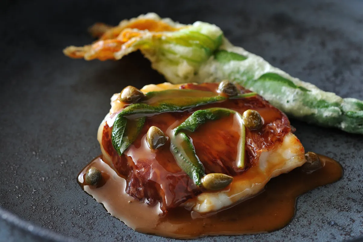 Fugu saltimbocca with beef prosciutto and zucchini flower fritters