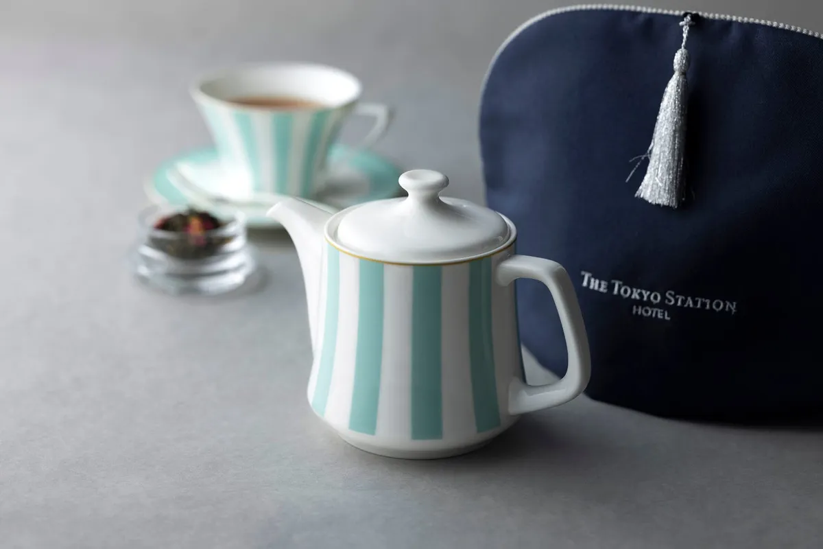 Striped teapot and tea cozy