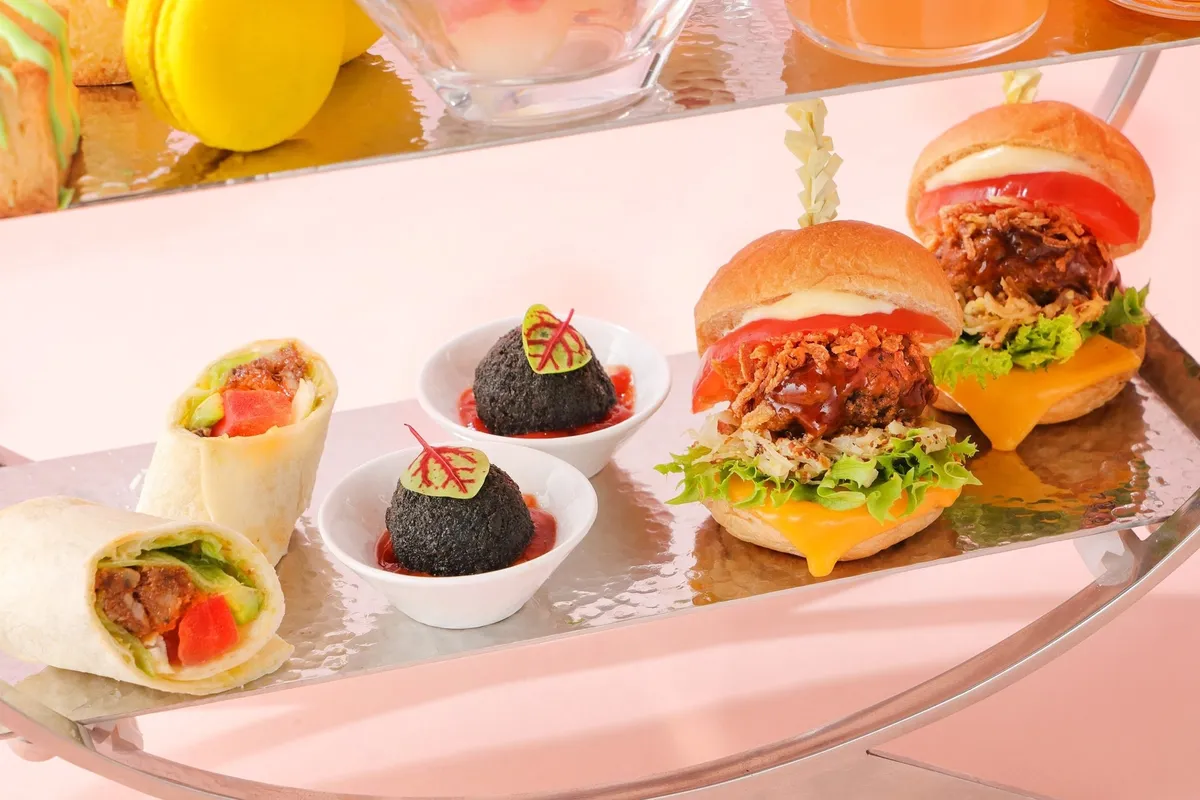 Lower tier savory items featuring Wagyu burgers and tortillas