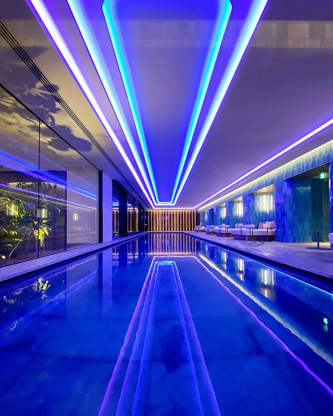 Neon-lit WET indoor pool at W Osaka