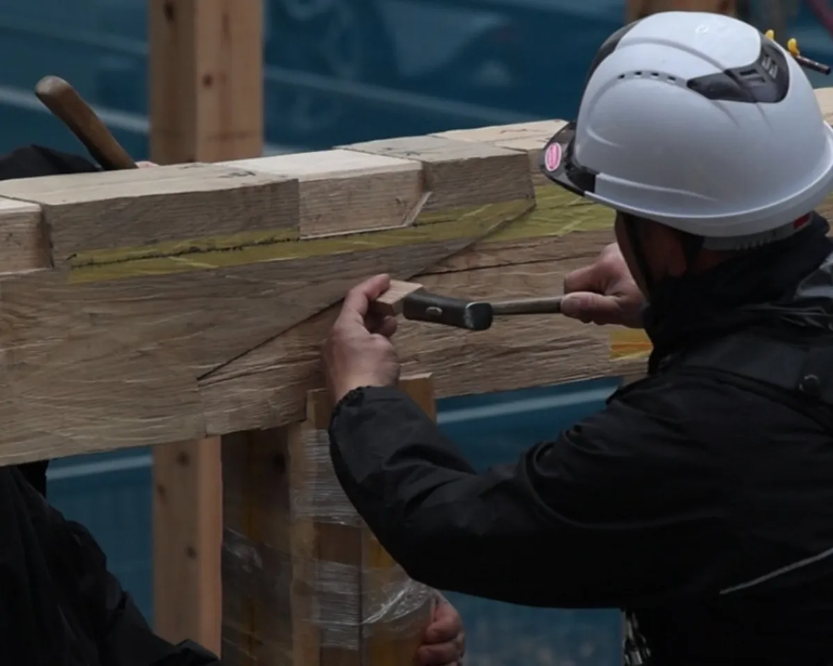 The construction process utilizes manual assembly techniques