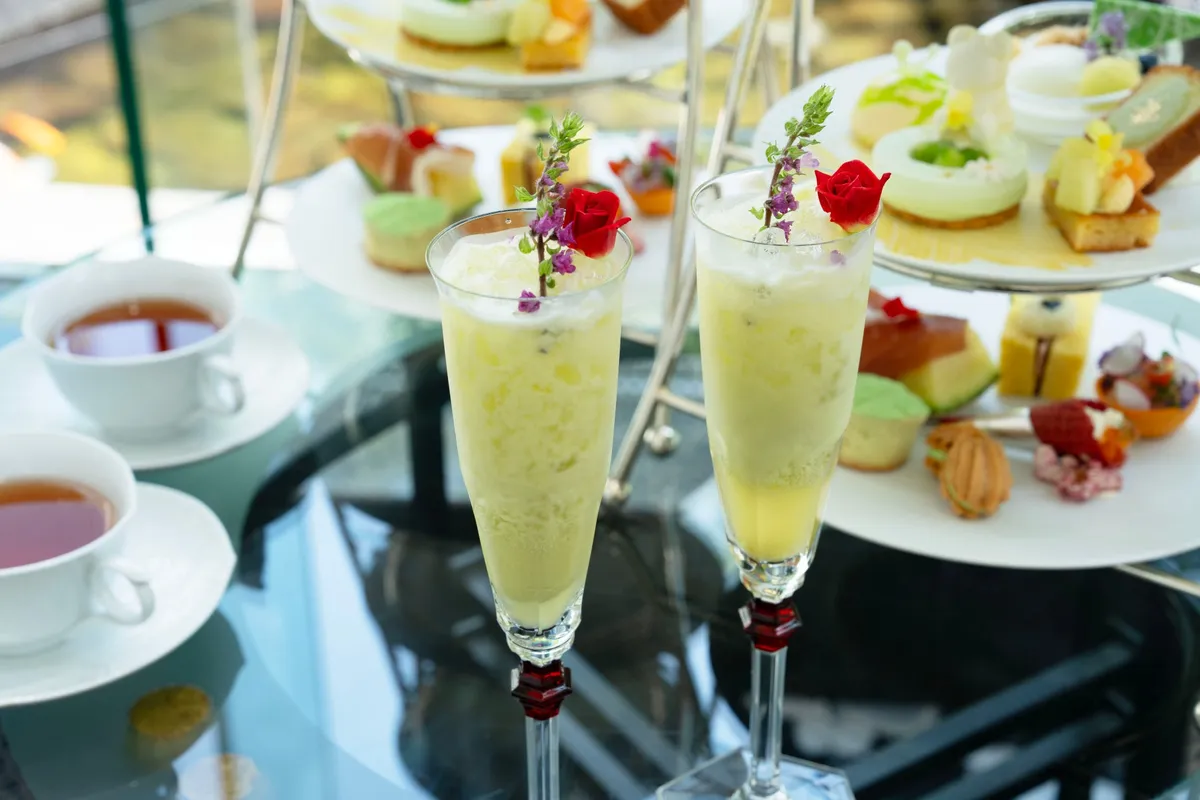 Melon cocktails with floral garnishes