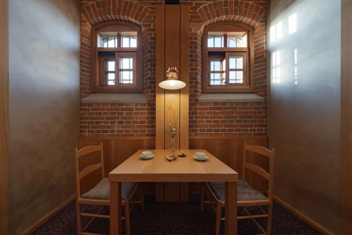 A private dining room located within a former cell