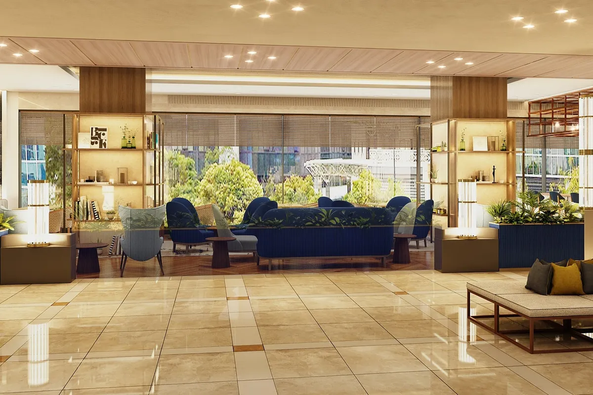 The lobby lounge featuring open spaces and blue seating