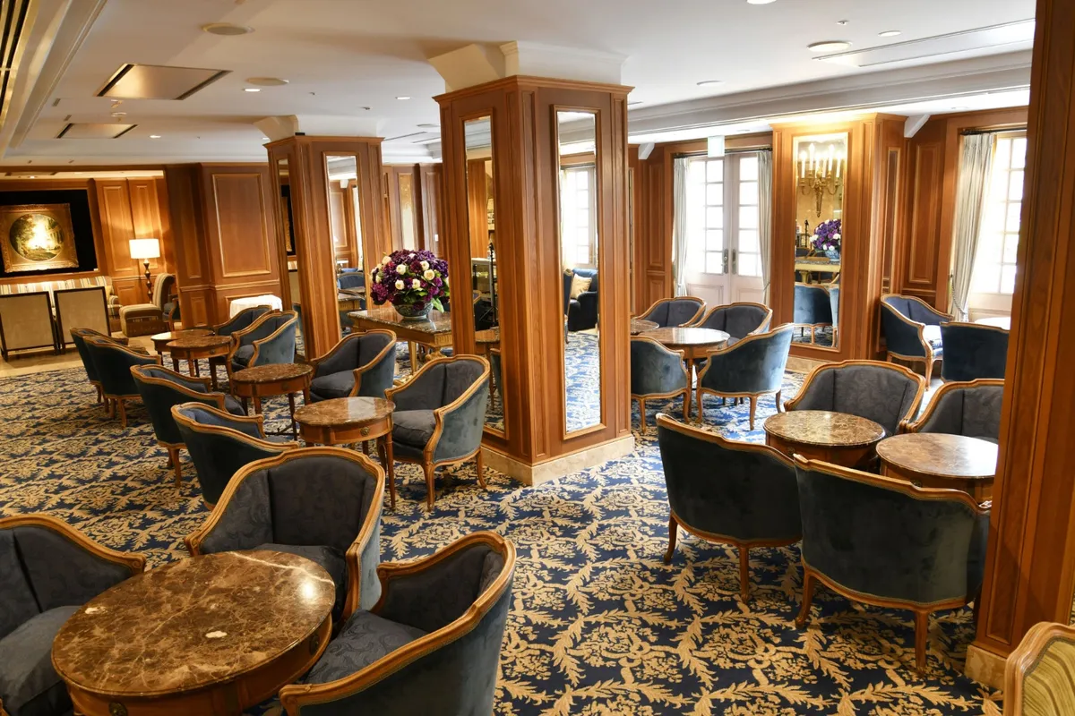 Lobby Lounge La Terrasse interior with blue chairs