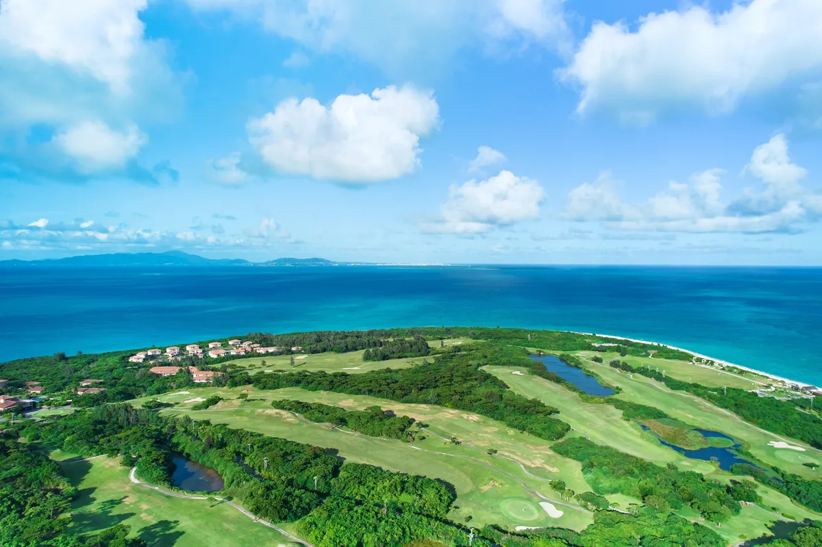 Aerial view of Hoshino Resorts Risonare Kohamajima and its golf course