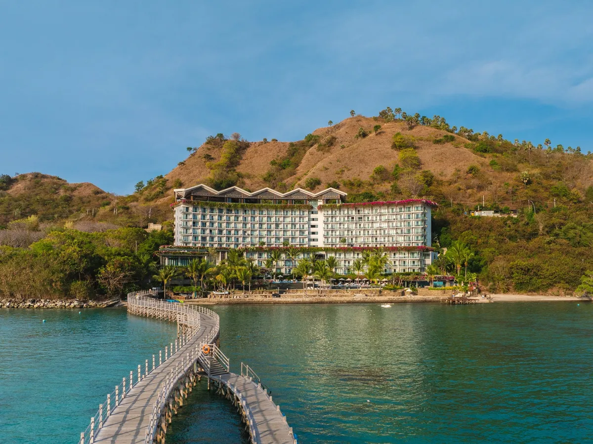 Aerial view of Ayana Komodo Waecichu Beach and its pier