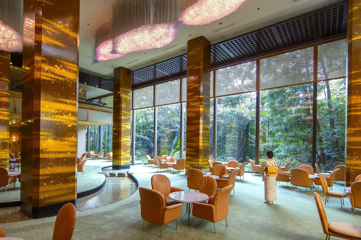 The Main Lounge featuring floor-to-ceiling garden views