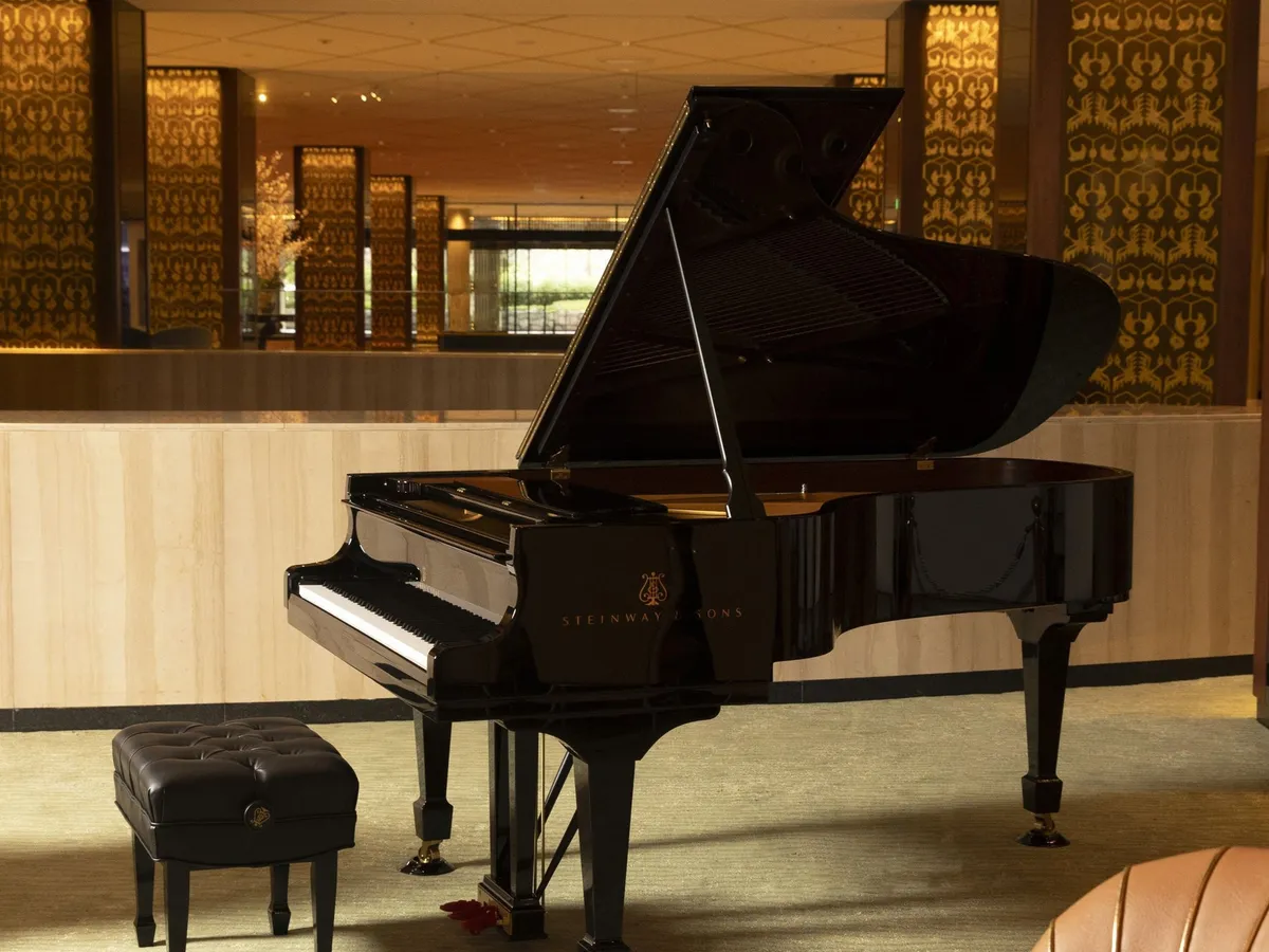 The Steinway & Sons SPIRIO player piano in the lounge