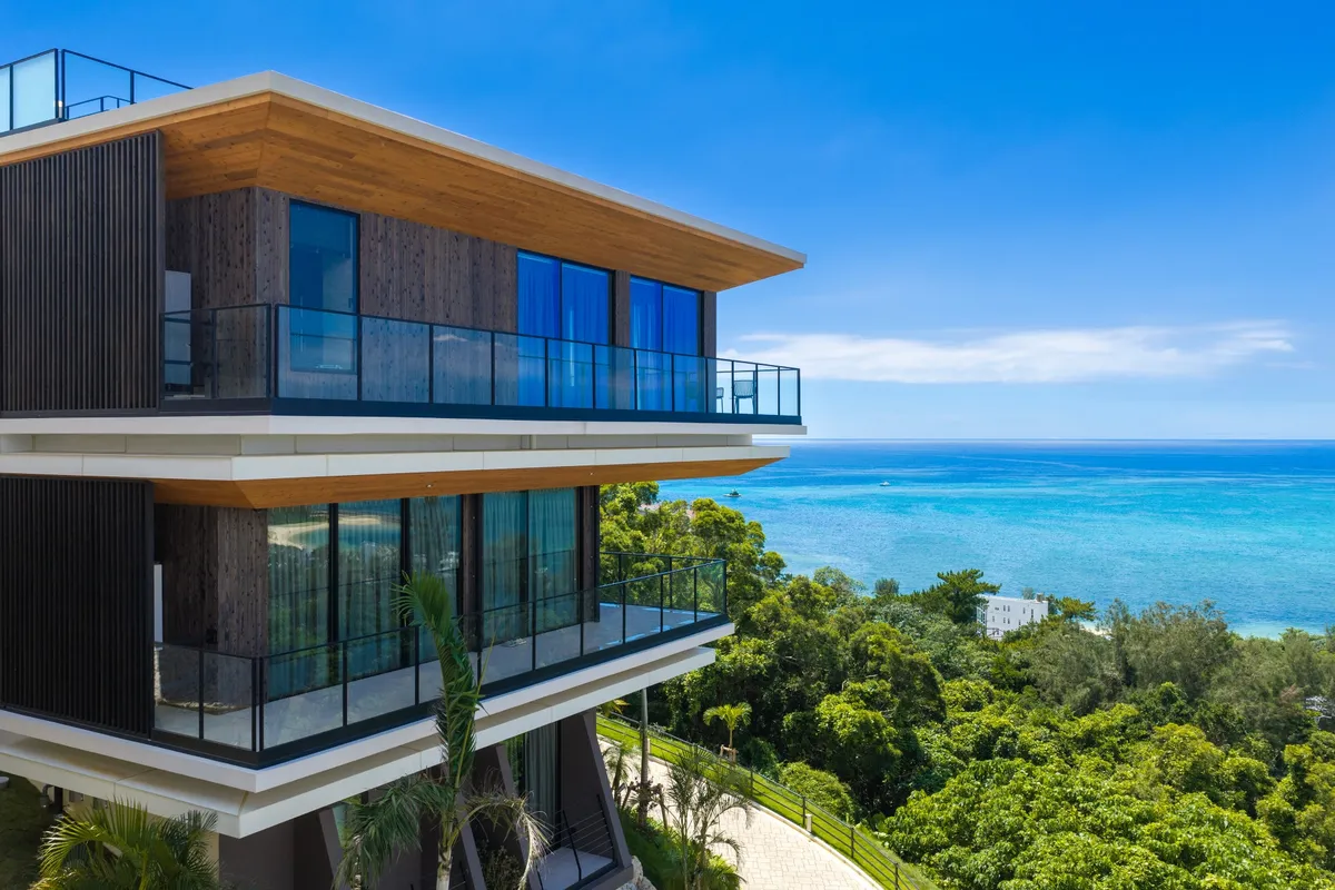 Villa OCEAN architecture against the blue sea.