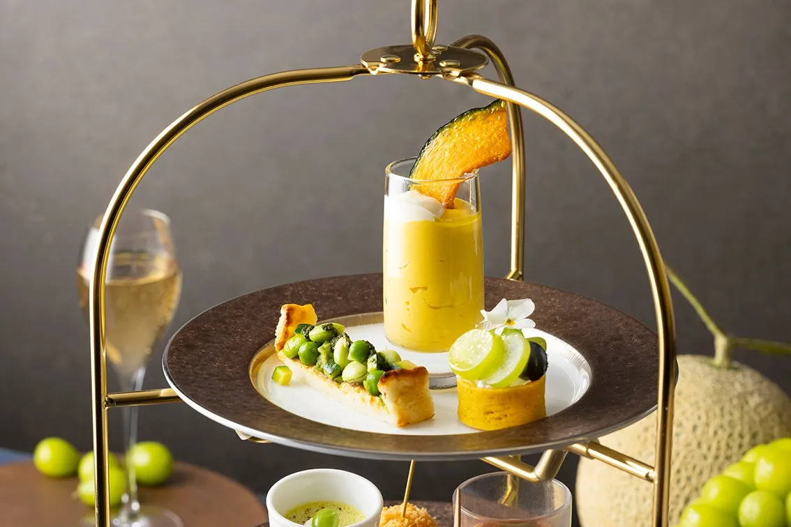 Top tier of the afternoon tea stand featuring pumpkin mousse